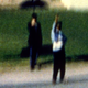 Illustration for article titled Why Conspiracy Theorists Are So Obsessed With JFK's "Umbrella Man"